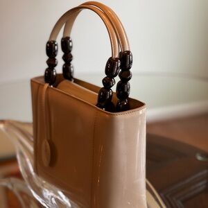 Polished Christian Dior Tan Patent Shoulder Bag with Glossy Bead Handles